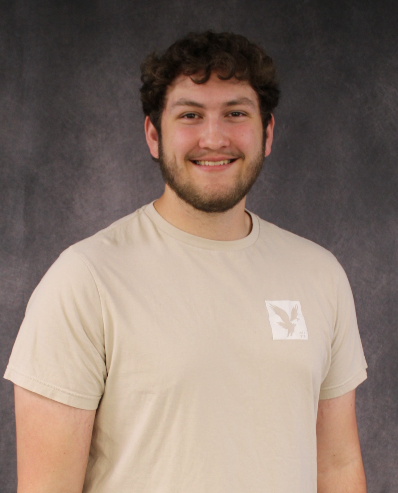 Connor Hohlen smiling for a portrait