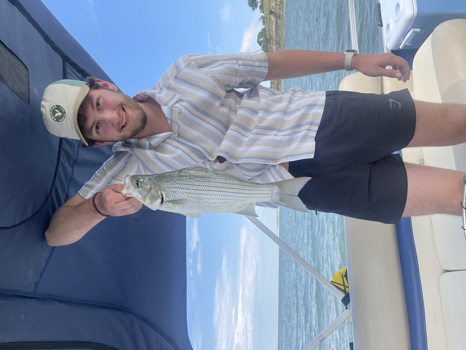 Connor enjoying time outdoors while fishing