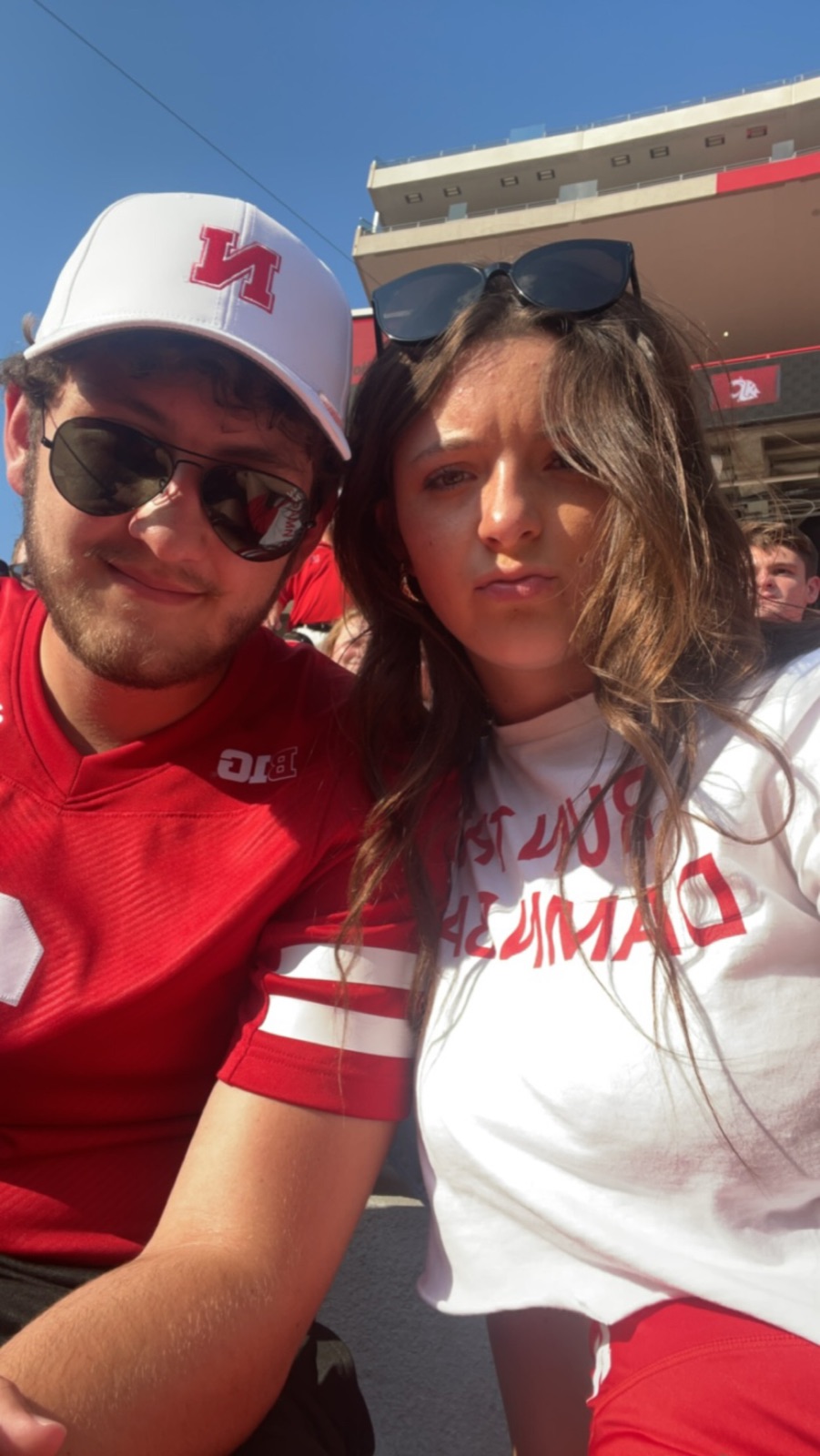 Friends enjoying a Nebraska game day
