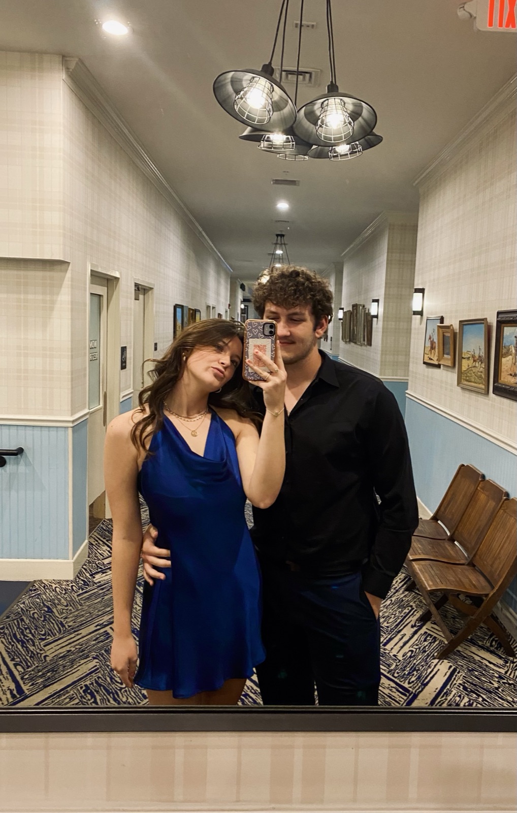 Connor and a friend dressed for a formal event