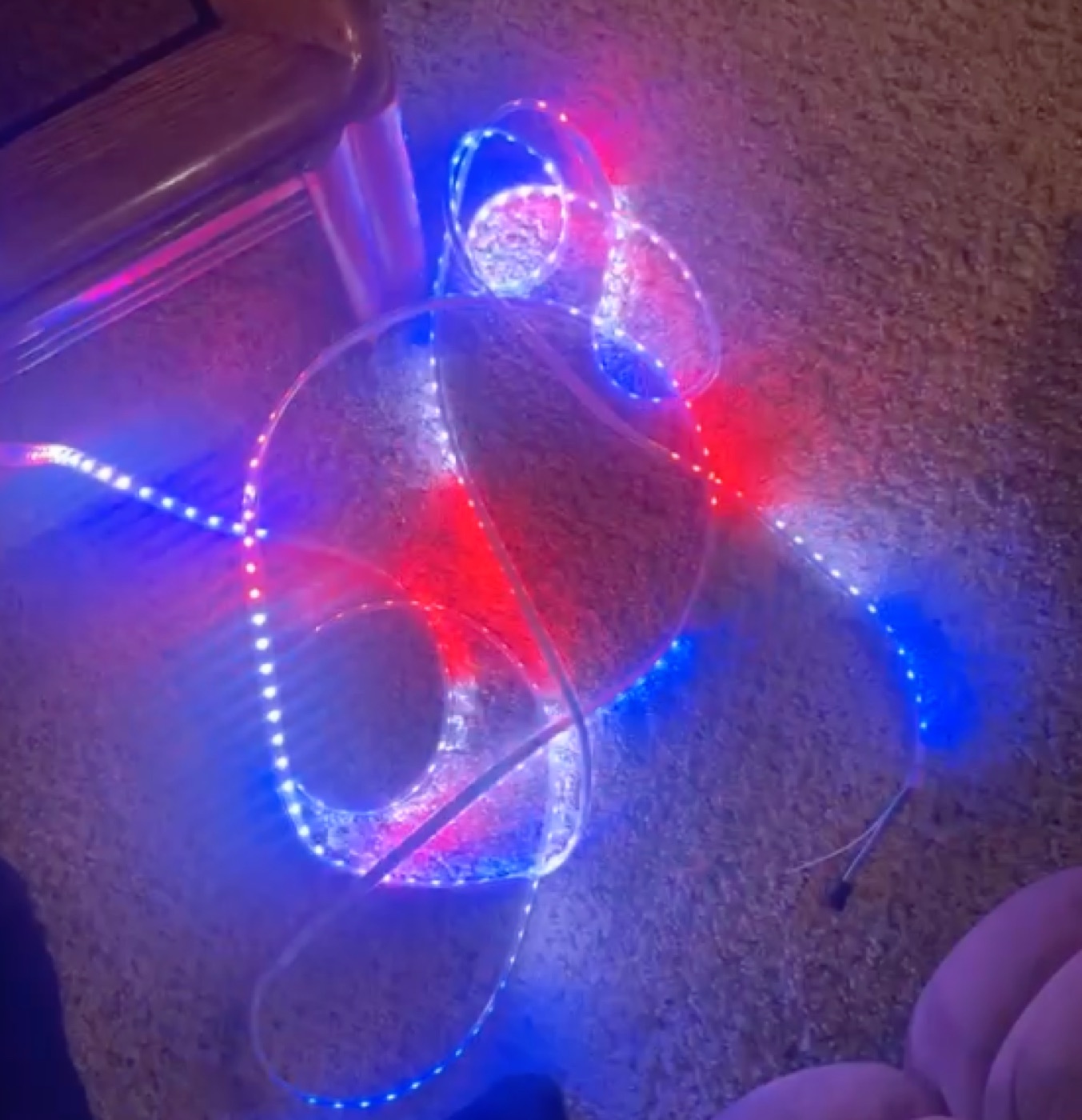 Individually addressable LED strips glowing red, white, and blue